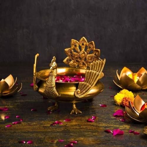 Hand Carved Brass Peacock Urli Pot – Festive Decorative Centerpiece for Home