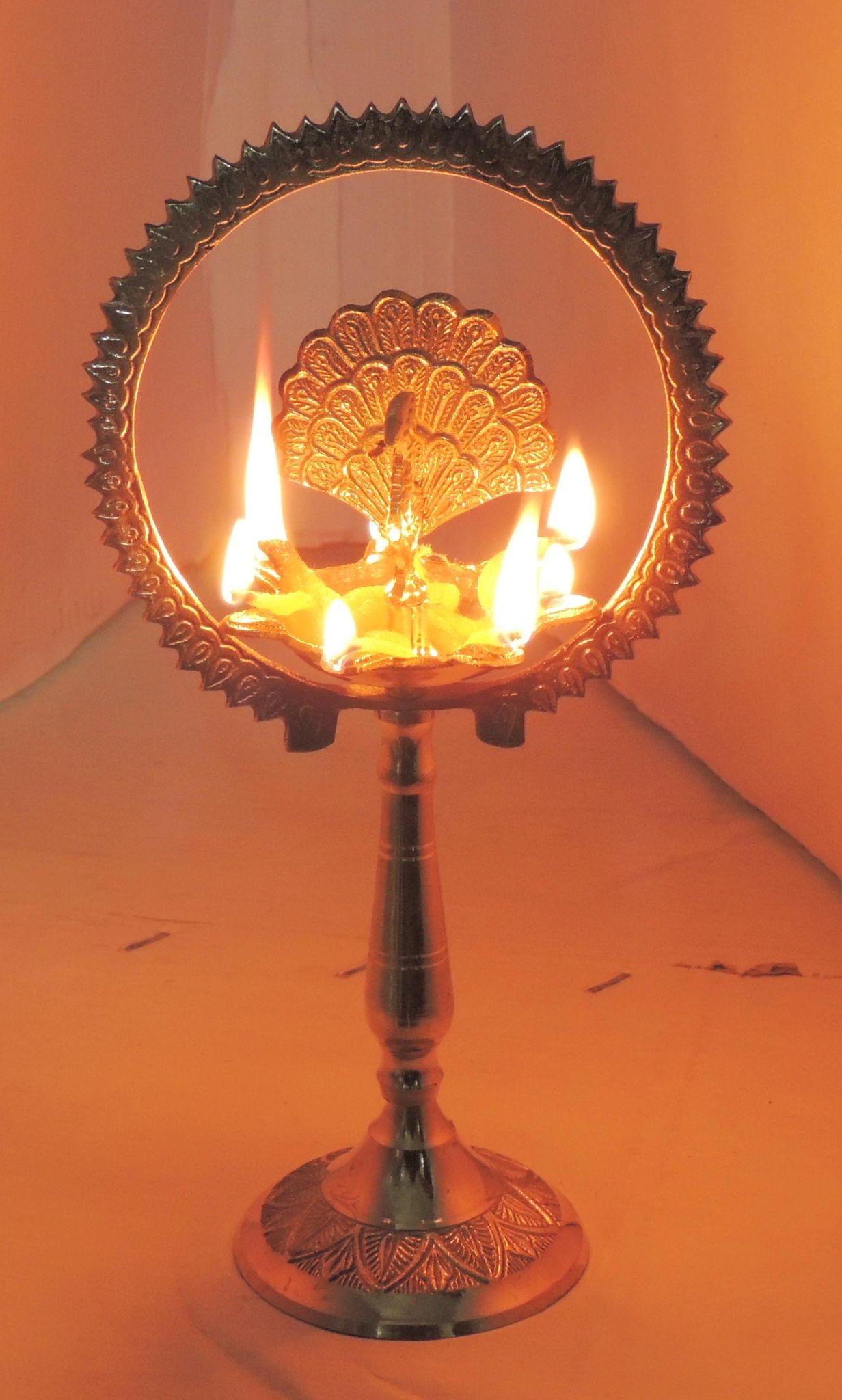 Deepak More Charkar 6 – Traditional Peacock Wheel Oil Lamp for Puja